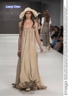 London, UK. 6 June 2016. A model walks the runway showcasing the fashion collection by Lianyi Chen from Nottingham Trent University during Graduate Fashion Week 2016. GFW takes place at the Old Truman Brewery from 5 to 8 June 2016. Nottingham Trent University, Graduate Fashion Week 2016 