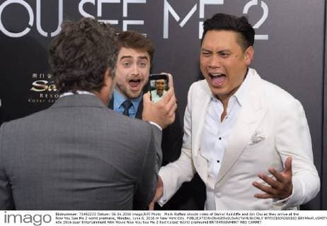 Mark Ruffalo shoots video of Daniel Radcliffe and Jon Chu as they arrive at the Now You See Me 2 world premiere, Monday, June 6, 2016 in New York City.  NYP201604269160 BRYANxR.xSMITH