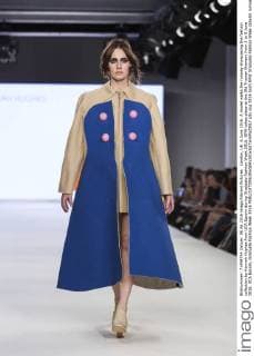 London, UK. 6 June 2016. A model walks the runway showcasing the fashion collection by Hannah Hughes from UCA Epsom during Graduate Fashion Week 2016. GFW takes place at the Old Truman Brewery from 5 to 8 June 2016. UCA Epsom, Graduate Fashion Week 2016 