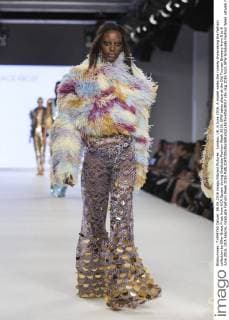 London, UK. 6 June 2016. A model walks the runway showcasing the fashion collection by Ellie-Grace Frost from UCA Epsom during Graduate Fashion Week 2016. GFW takes place at the Old Truman Brewery from 5 to 8 June 2016. UCA Epsom, Graduate Fashion Week 2016 