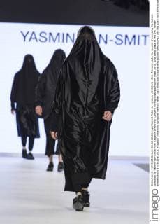 London, UK. 6 June 2016. A model walks the runway showcasing the fashion collection by Yasmin Van-Smith from Kingston University (London) during Graduate Fashion Week 2016. GFW takes place at the Old Truman Brewery from 5 to 8 June 2016. Kingston University, Graduate Fashion Week 2016 