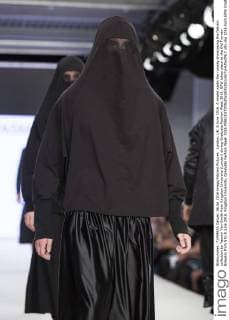 London, UK. 6 June 2016. A model walks the runway showcasing the fashion collection by Yasmin Van-Smith from Kingston University (London) during Graduate Fashion Week 2016. GFW takes place at the Old Truman Brewery from 5 to 8 June 2016. Kingston University, Graduate Fashion Week 2016 