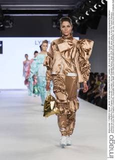 London, UK. 6 June 2016. A model walks the runway showcasing the fashion collection by Lydia Bolton from Kingston University (London) during Graduate Fashion Week 2016. GFW takes place at the Old Truman Brewery from 5 to 8 June 2016. Kingston University, Graduate Fashion Week 2016 