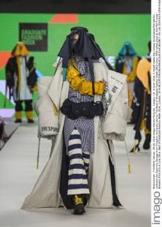 London, UK. 8 June 2016. A model walks the runway showcasing the fashion collection by Caoimhe Savage from Kingston University during The Best of Graduate Fashion Week 2016 show. GFW takes place at the Old Truman Brewery from 5 to 8 June 2016. Best of Graduate Fashion Week 2016, London, UK 