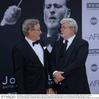 Directors Steven Spielberg (L) and George Lucas attend American Film Institutes 44th Life Achievement Award gala tribute to composer John Williams at the Dolby Theatre in the Hollywood section of Los Angeles on June 9, 2016. Over six decades in Hollywood, Williams has written some of the most memorable music in movie history. His 100-plus features have earned 50 Academy Award nominations (making him the most-nominated living person), winning five times. Williams also received 22 Grammys, seven BAFTAs, five Emmys, four Golden Globes, a Kennedy Center Honor and the National Medal of Arts. And then there are all those iconic themes, the ones everyone in the world knows.  LAP2016060916 JIMxRUYMEN
