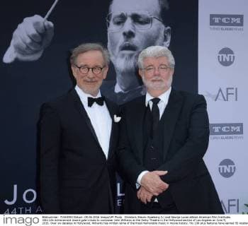 Directors Steven Spielberg (L) and George Lucas attend American Film Institutes 44th Life Achievement Award gala tribute to composer John Williams at the Dolby Theatre in the Hollywood section of Los Angeles on June 9, 2016. Over six decades in Hollywood, Williams has written some of the most memorable music in movie history. His 100-plus features have earned 50 Academy Award nominations (making him the most-nominated living person), winning five times. Williams also received 22 Grammys, seven BAFTAs, five Emmys, four Golden Globes, a Kennedy Center Honor and the National Medal of Arts. And then there are all those iconic themes, the ones everyone in the world knows.  LAP2016060917 JIMxRUYMEN