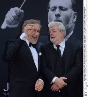 Directors Steven Spielberg (L) and George Lucas attend American Film Institutes 44th Life Achievement Award gala tribute to composer John Williams at the Dolby Theatre in the Hollywood section of Los Angeles on June 9, 2016. Over six decades in Hollywood, Williams has written some of the most memorable music in movie history. His 100-plus features have earned 50 Academy Award nominations (making him the most-nominated living person), winning five times. Williams also received 22 Grammys, seven BAFTAs, five Emmys, four Golden Globes, a Kennedy Center Honor and the National Medal of Arts. And then there are all those iconic themes, the ones everyone in the world knows.  LAP2016060913 JIMxRUYMEN
