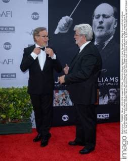 Directors Steven Spielberg (L) and George Lucas attend American Film Institutes 44th Life Achievement Award gala tribute to composer John Williams at the Dolby Theatre in the Hollywood section of Los Angeles on June 9, 2016. Over six decades in Hollywood, Williams has written some of the most memorable music in movie history. His 100-plus features have earned 50 Academy Award nominations (making him the most-nominated living person), winning five times. Williams also received 22 Grammys, seven BAFTAs, five Emmys, four Golden Globes, a Kennedy Center Honor and the National Medal of Arts. And then there are all those iconic themes, the ones everyone in the world knows.  LAP2016060919 JIMxRUYMEN