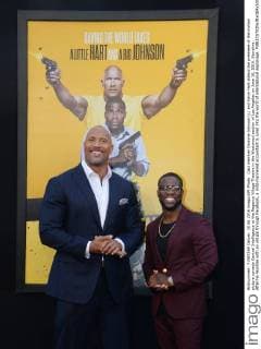 Cast member Dwayne Johnson (L) and Kevin Hart attend the premiere of the motion picture comedy Central Intelligence at the Regency Village Theatre in the Westwood section of Los Angeles on June 10, 2016. Storyline: After he reunites with an old pal through Facebook, a mild-mannered accountant is lured into the world of international espionage.  LAP2016061002 JIMxRUYMEN