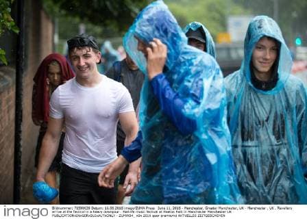 June 11, 2016 - Manchester, Greater Manchester, UK - Manchester , UK . Revellers arrive at the festival in a heavy downpour . Parklife music festival at Heaton Park in Manchester Manchester UK  - ZUMAl94_