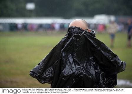 June 11, 2016 - Manchester, Greater Manchester, UK - Manchester , UK . A man wearing a bin liner as a poncho at the Parklife music festival at Heaton Park in Manchester Manchester UK  - ZUMAl94_