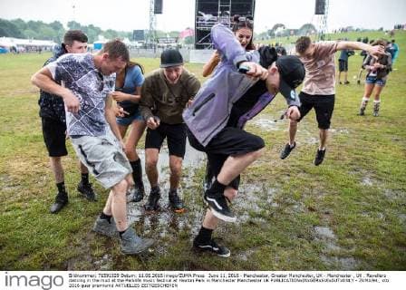 June 11, 2016 - Manchester, Greater Manchester, UK - Manchester , UK . Revellers dancing in the mud at the Parklife music festival at Heaton Park in Manchester Manchester UK  - ZUMAl94_