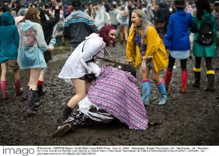 June 11, 2016 - Manchester, Greater Manchester, UK - Manchester , UK . Revellers fall in the mud at the Parklife music festival at Heaton Park in Manchester Manchester UK  - ZUMAl94_