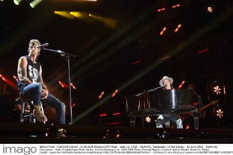 June 11, 2016 - Nashville, Tennessee, United States - 11 June 2016 - Nashville, Tennessee - Tyler Hubbard and Brian Kelley, Florida Georgia Line. 2016 CMA Music Festival Nightly Concert held at Nissan Stadium. Photo Credit: Laura Farr AdMedia Nashville United States - ZUMAa123