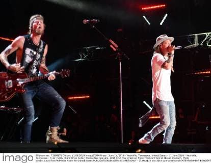June 11, 2016 - Nashville, Tennessee, United States - 11 June 2016 - Nashville, Tennessee - Tyler Hubbard and Brian Kelley, Florida Georgia Line. 2016 CMA Music Festival Nightly Concert held at Nissan Stadium. Photo Credit: Laura Farr AdMedia Nashville United States - ZUMAa123
