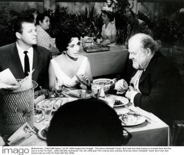 The actors Elizabeth Taylor, Burl Ives and Jack Carson in a scene from the film Cat on a Hot Tin Roof , 1958 x06709x 