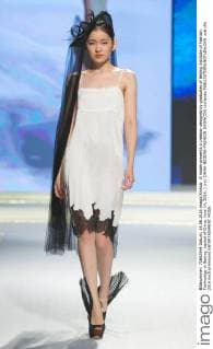 A model presents a creation designed by graduates of Beijing Institute of Fashion Technology in Beijing, capital of China, June 14, 2016. ) (ry) CHINA-BEIJING-FASHION SHOW(CN) LixJianbo 