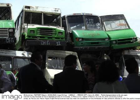 (160616) -- MEXICO CITY, June 16, 2016 -- Public transportation units are seen stacked during the start of the scrappage process of minibuses, in Mexico City, capital of Mexico, on June 15, 2016. According to local press, as Mexico City Mayor Miguel Angel Mancera announced last week the substitution of the minibuses for less pollutant vehicles to offer the public transportation service, the scrappage process began on Wednesday. Str) (da) (fnc) MEXICO-MEXICO CITY-TRANSPORTATION-SCRAPPAGE e STR 