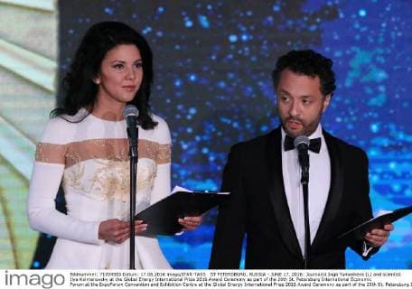 ST PETERSBURG, RUSSIA - JUNE 17, 2016: Journalist Inga Yumasheva (L) and scientist Ilya Kolmanovsky at the Global Energy International Prize 2016 Award Ceremony as part of the 20th St. Petersburg International Economic Forum at the ExpoForum Convention and Exhibition Centre at the Global Energy International Prize 2016 Award Ceremony as part of the 20th St. Petersburg International Economic Forum at the ExpoForum Convention and Exhibition Centre. Sergei Savostyanov TASS  TS026E5B