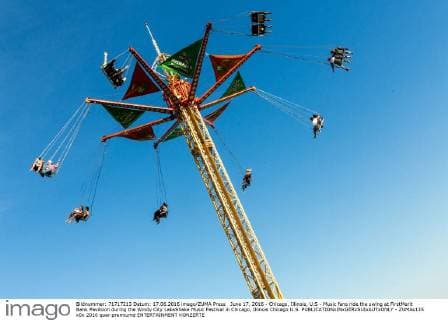 June 17, 2016 - Chicago, Illinois, U.S - Music fans ride the swing at FirstMerit Bank Pavilsion during the Windy City LakeShake Music Festival in Chicago, Illinois Chicago U.S. - ZUMAs135