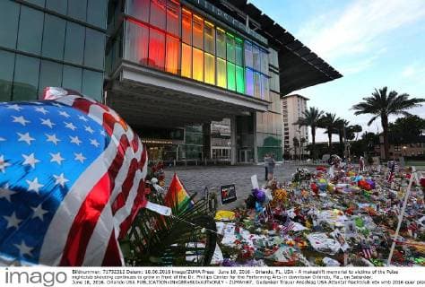 June 18, 2016 - Orlando, FL, USA - A makeshift memorial to victims of the Pulse nightclub shooting continues to grow in front of the Dr. Phillips Center for the Performing Arts in downtown Orlando, Fla., on Saturday, June 18, 2016. Orlando USA - ZUMAm67_