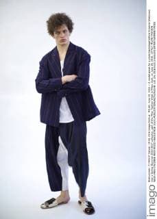 MILAN, June 19, 2016 -- A model poses for a photo backstage before Vivienne Westwood men s Spring-Summer 2016-2017 collection, part of the Milan Fashion Week in Milan, Italy, on June 19, 2016. ) ITALY-MILAN-FASHION WEEK-MEN-VIVIENNE WESTWOOD-BACKSTAGE JinxYu 