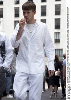 June 19, 2016 - Milan, Italy - A man walks before Salvatore Ferragamo show at Milan Men s Fashion Week in Milan on 19 June, 2016 Milan Italy  - ZUMAn230