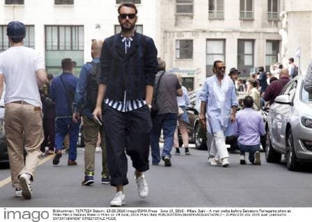 June 19, 2016 - Milan, Italy - A man walks before Salvatore Ferragamo show at Milan Men s Fashion Week in Milan on 19 June, 2016 Milan Italy  - ZUMAn230