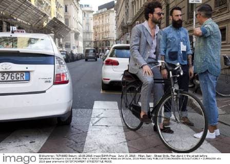 June 19, 2016 - Milan, Italy - Street Style. Men stand in the street before Salvatore Ferragamo show at Milan Men s Fashion Week in Milan on 19 June, 2016 Milan Italy  - ZUMAn230