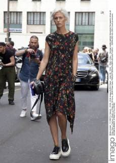June 19, 2016 - Milan, Italy - Woman walks before Salvatore Ferragamo show at Milan Men s Fashion Week in Milan on 19 June, 2016 Milan Italy  - ZUMAn230