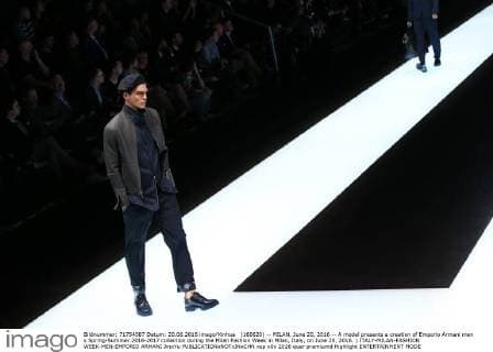(160620) -- MILAN, June 20, 2016 -- A model presents a creation of Emporio Armani men s Spring-Summer 2016-2017 collection during the Milan Fashion Week in Milan, Italy, on June 20, 2016. ) ITALY-MILAN-FASHION WEEK-MEN-EMPORIO ARMANI JinxYu 