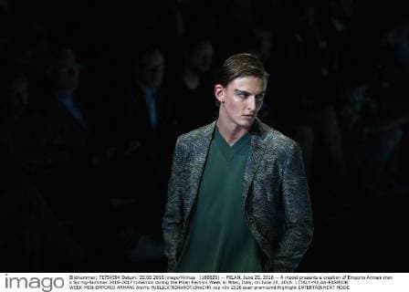 (160620) -- MILAN, June 20, 2016 -- A model presents a creation of Emporio Armani men s Spring-Summer 2016-2017 collection during the Milan Fashion Week in Milan, Italy, on June 20, 2016. ) ITALY-MILAN-FASHION WEEK-MEN-EMPORIO ARMANI JinxYu 