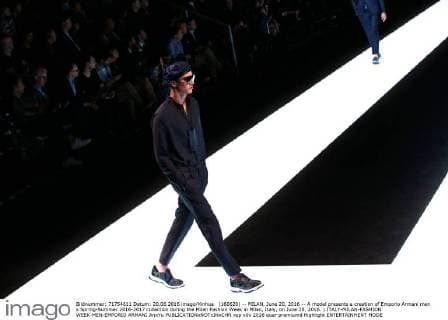 (160620) -- MILAN, June 20, 2016 -- A model presents a creation of Emporio Armani men s Spring-Summer 2016-2017 collection during the Milan Fashion Week in Milan, Italy, on June 20, 2016. ) ITALY-MILAN-FASHION WEEK-MEN-EMPORIO ARMANI JinxYu 