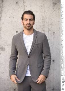 milan s Fashion Week Spring Summer 2017. Emporio Armani Arrivals Pictured: Nyle Dimarco  SimonaxChioccia