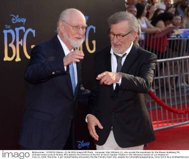 Composer John Williams (L), who scored the soundtrack for the Steven Spielberg (R) directed motion picture fantasy BFG attends the premiere of the film at the El Capitan Theatre in the Hollywood section of Los Angeles on June 21, 2016. Storyline: A girl named Sophie encounters the Big Friendly Giant who, despite his intimidating appearance, turns out to be a kindhearted soul who is considered an outcast by the other giants because, unlike them, he refuses to eat children.  LAP2016062124 JIMxRUYMEN