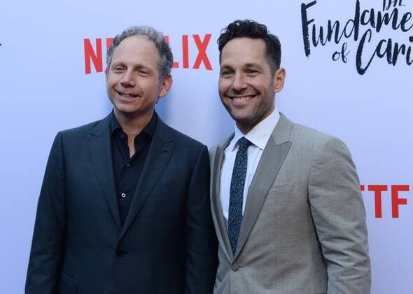 Director Rob Burnett (L) and cast member Paul Rudd attend a screening of Netflix s motion picture drama The Fundamentals of Caring at the ArcLight Cinema Dome in the Hollywood section of Los Angeles on June 23, 2016. Storyline: A man suffering an incredible amount of loss enrolls in a class about care-giving that changes his perspective on life.  LAP2016062322 JIMxRUYMEN
