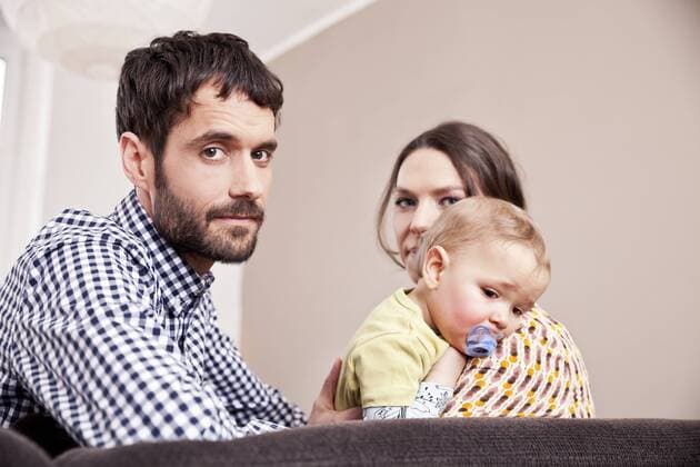 Parents with sick toddler at home model released Symbolfoto property released  MFF002976