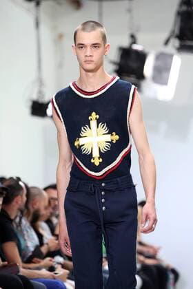 A model takes to the catwalk during the presentation of Christian Dada s show as part of the Spring-Summer 2017 Fashion Week in Paris on June 24, 2016.  PAR20160624110 MAYAxVIDON-WHITE