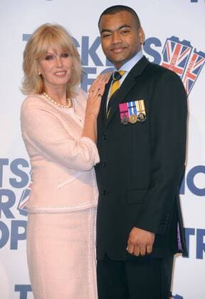 Jan. 11, 2010 - London, Great Britain - Joanna Lumley is joined by ROH CEO Tony Hall, Johnson Beharry VC and Tickets For Troops Director Jonathan Mervis to announce special free opera and ballet programme at the Royal Opera House on January 11, 2009 in London. Picture by Marc Larkin LFI  - ZUMAl60_