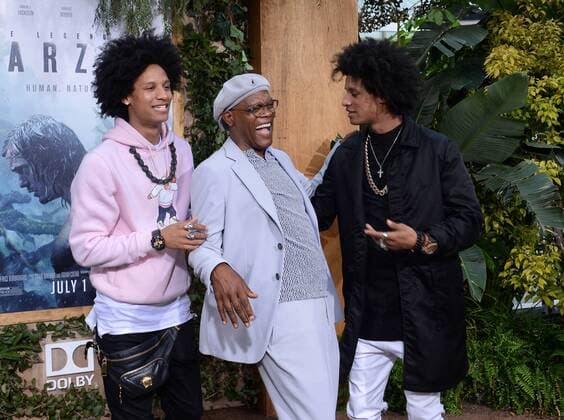 Cast member Samuel L. Jackson (C) mingles with the Les Twins during the premiere of the motion picture adventure film The Legend of Tarzan at the Dolby Theatre in the Hollywood section of Los Angeles on June 27, 2016. Storyline: Tarzan, having acclimated to life in London, is called back to his former home in the jungle to investigate the activities at a mining encampment.  LAP2016062735 JIMxRUYMEN