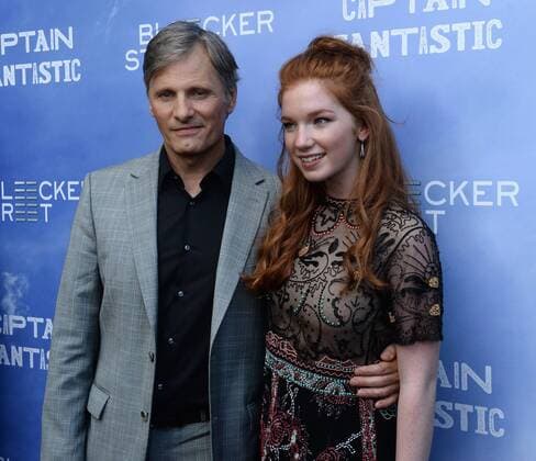 Captain Fantastic Premiere in Hollywood Cast members Viggo Mortensen (L) and Annalise Basso attend the premiere of the motion picture drama Captain Fantastic at the Harmony Gold Theatre in the Hollywood section of Los Angeles on June 26, 2016. Storyline: In the forests of the Pacific Northwest, a father devoted to raising his six kids with a rigorous physical and intellectual education is forced to leave his paradise and enter the world, challenging his idea of what it means to be a parent.  LAP2016062838 JIMxRUYMEN