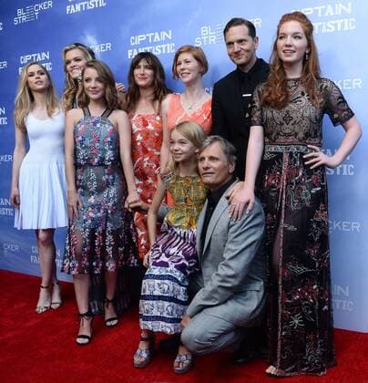 Captain Fantastic Premiere in Hollywood Cast members, Erin Moriarty, Samantha Isler, Missi Pyle, Kathryn Hahn, Trin Miller, writer director Matt Ross, actress Annalise Basso (L-R), actress Shree Crooks and actor Viggo Mortensen, foreground, attend the premiere of the motion picture drama Captain Fantastic at the Harmony Gold Theatre in the Hollywood section of Los Angeles on June 26, 2016. Storyline: In the forests of the Pacific Northwest, a father devoted to raising his six kids with a rigorous physical and intellectual education is forced to leave his paradise and enter the world, challenging his idea of what it means to be a parent. LAP2016062854 JIMxRUYMEN