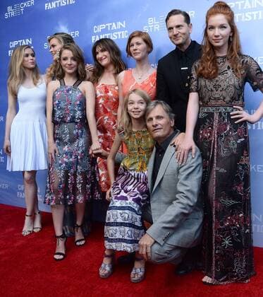 Captain Fantastic Premiere in Hollywood Cast members, Erin Moriarty, Samantha Isler, Missi Pyle, Kathryn Hahn, Trin Miller, writer director Matt Ross, actress Annalise Basso (L-R), actress Shree Crooks and actor Viggo Mortensen, foreground, attend the premiere of the motion picture drama Captain Fantastic at the Harmony Gold Theatre in the Hollywood section of Los Angeles on June 26, 2016. Storyline: In the forests of the Pacific Northwest, a father devoted to raising his six kids with a rigorous physical and intellectual education is forced to leave his paradise and enter the world, challenging his idea of what it means to be a parent. LAP2016062853 JIMxRUYMEN