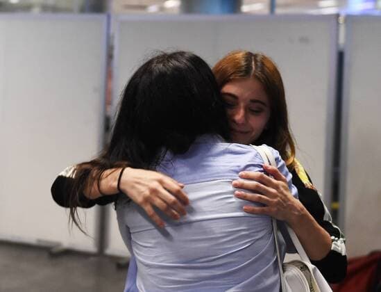 (160629) -- ISTANBUL, June 29, 2016 -- Two passengers hug each other at Istanbul s Ataturk airport in Turkey on June 29, 2016. The Ataturk airport in Istanbul resumed business early Wednesday morning with boosted security, following hours of mess and chaos that ensued from a series of suicide bombing attacks. ) TURKEY-ISTANBUL-ATATURK AIRPORT-EXPLOSION-RECOVERING HexCanling 