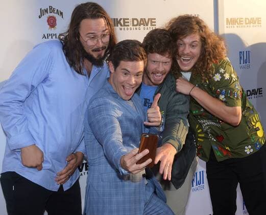 Cast member Adam Devine (C) does a selfie with actors Kyle Newacheck, Anders Holm and Blake Anderson (L-R) during the premiere of the motion picture comedy Mike and Dave Need Wedding Dates at the ArcLight Cinema Dome in the Hollywood section of Los Angeles on June 29, 2016. Storyline: Hard-partying brothers place an online ad to find the perfect dates for their sister s Hawaiian wedding. Hoping for a wild getaway, the boys instead find themselves outsmarted and out-partied by the uncontrollable duo.  LAP2016062906 JIMxRUYMEN
