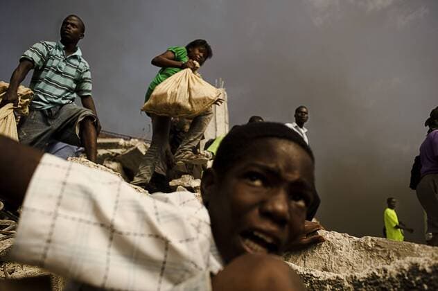 Jan 31, 2010 - Port-au-Prince, Haiti - Violence and looting have erupted in the capital city after a major earthquake toppled most of the city. Hungry, desperate and frustrated people of Haiti have decided to find their own means of survival in the badly damaged capital Port au Prince. - ZUMAl88_