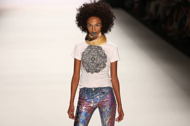 Germany: Jeans for Refugees by Johny Dar The Mercedes-Benz Fashion Week Berlin. Numerous labels are taking part in the German fashion week for the 2017 spring summer season. The photo shows Models with the collection of Jeans for Refugees by Dohny Dar on the catwalk in the Erika Hess Ice Stadium in Berlin-Weding. This year, the designer launched a global artistic collaboration called Jeans for Refugees , dedicated to the world s fugitives and involved over one hundred celebrities. The jeans-Unikate be exhibited in London in October 2016 the Saatchi Gallery and auctioned. The entire proceeds go to the International Rescue Committee, an organization that Escaped and war victims.  SimonexKuhlmey