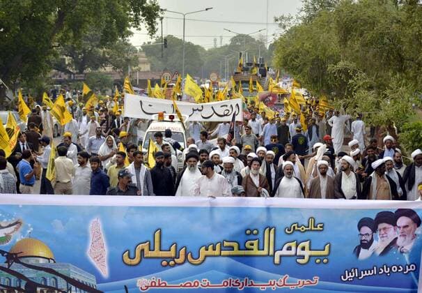 July 1, 2016 - Pakistan - LAHORE, PAKISTAN, JUL 01: Activists of Shia Ulema Council are marking Youm-ul-Quds in .support of Palestine as they are protesting against Israel and USA during demonstration in .Lahore on Friday, July 01, 2016. Pakistan  - ZUMAas3_