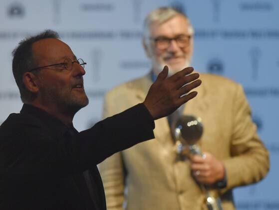 French actor Jean Reno, left, receives the Festival President s Award at the 51st Karlovy Vary International Film Festival in Karlovy Vary, Czech Republic, July 4, 2016. At right is Film Festival President Jiri Bartoska. (CTKxPhoto SlavomirxKubes) CTKPhotoP201607040865801  KBS_0136