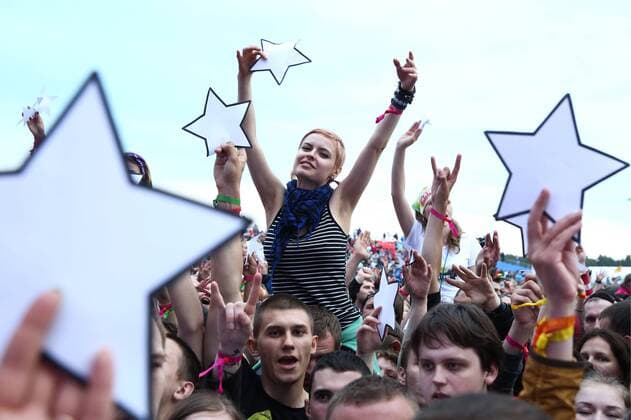TVER REGION, RUSSIA - JULY 8, 2016: People attend the 16th Nashestvie (Invasion) rock music festival in the village of Bolshoye Zavidovo. Alexander Ryumin TASS  TS0296A1